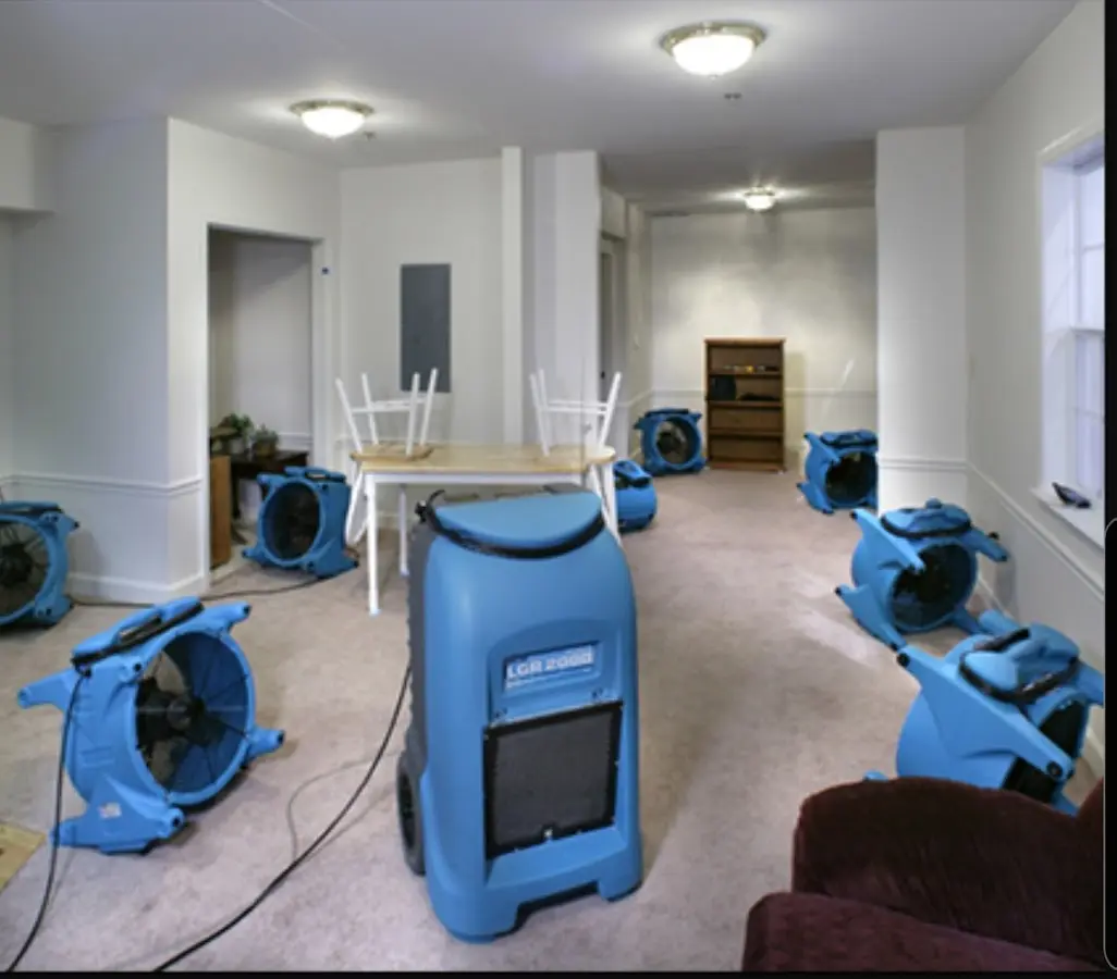 Air movers and dehumidifier setup for Water Damage Restoration in Seymour